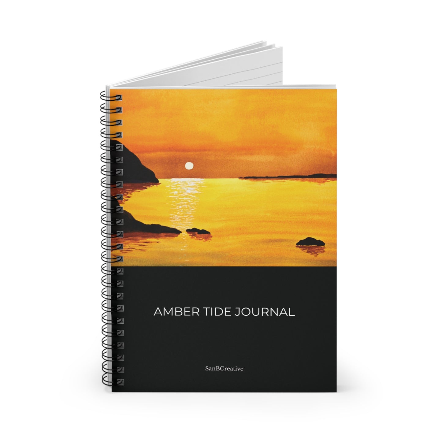 Spiral-bound notebook with sunset design on the cover, titled 'Amber Tide Journal'.