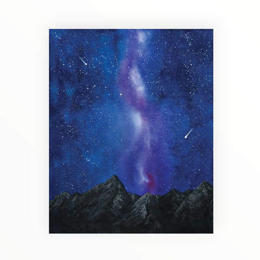 Aurora borealis over mountains in a starry night sky