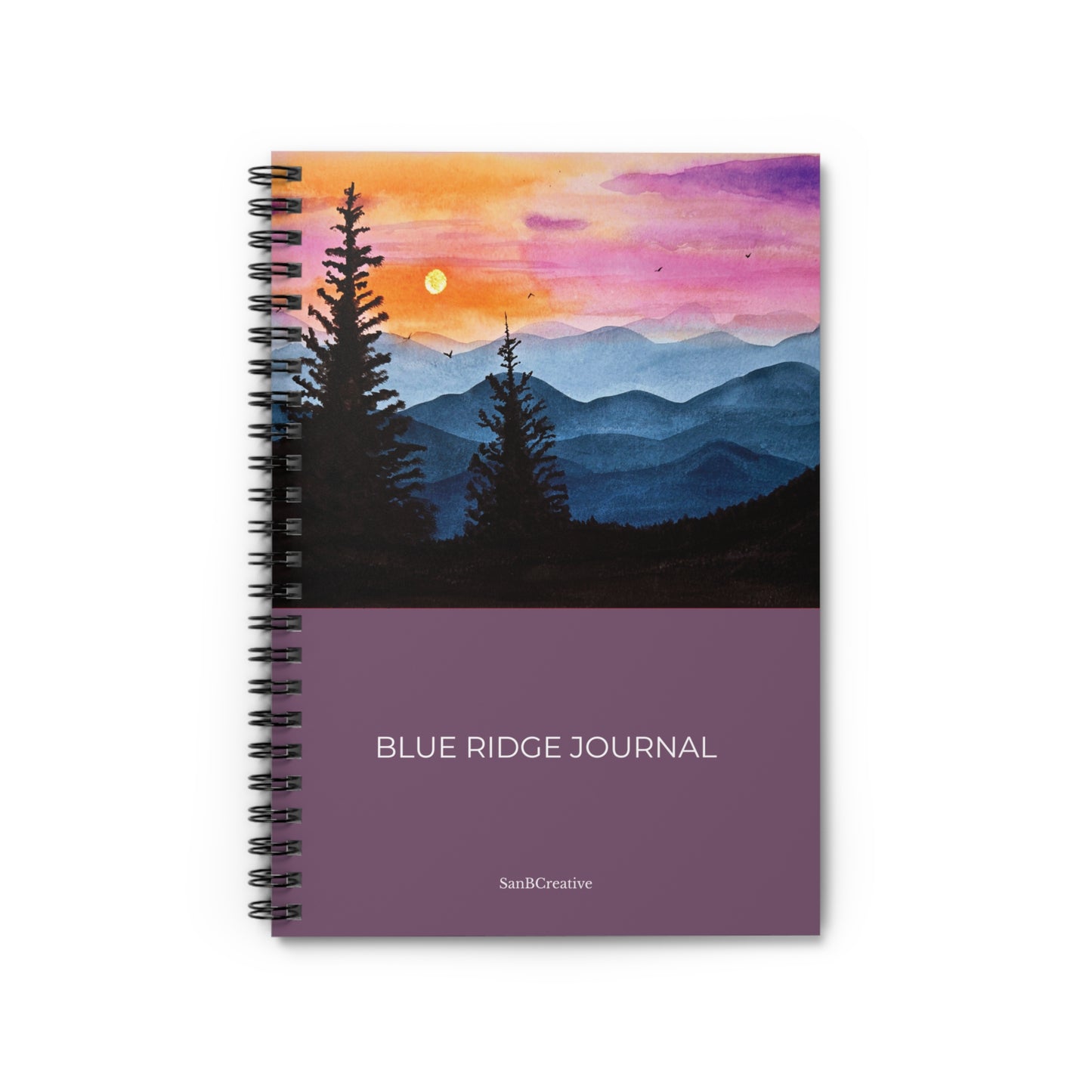 Spiral-bound notebook with a scenic cover design of mountains and trees, labeled 'Blue Ridge Journal'.
