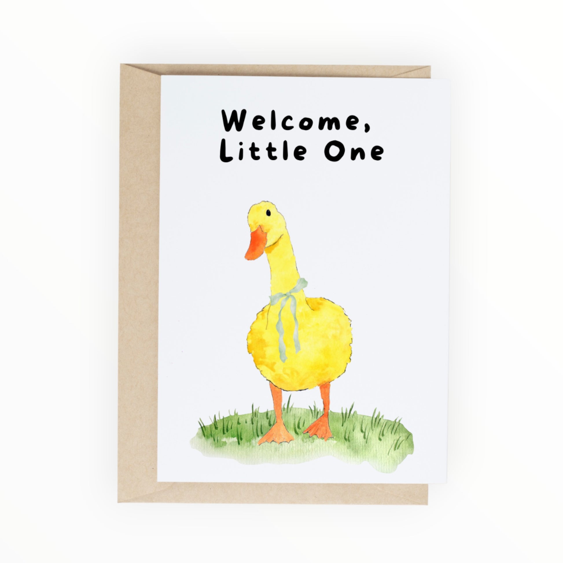Watercolor duck with a green ribbon standing in grass under the text ‘Welcome, Little One.